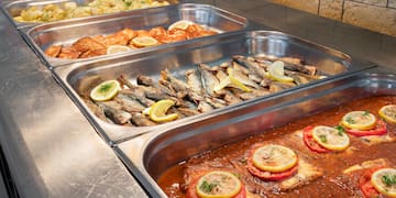a trays of food in a restaurant