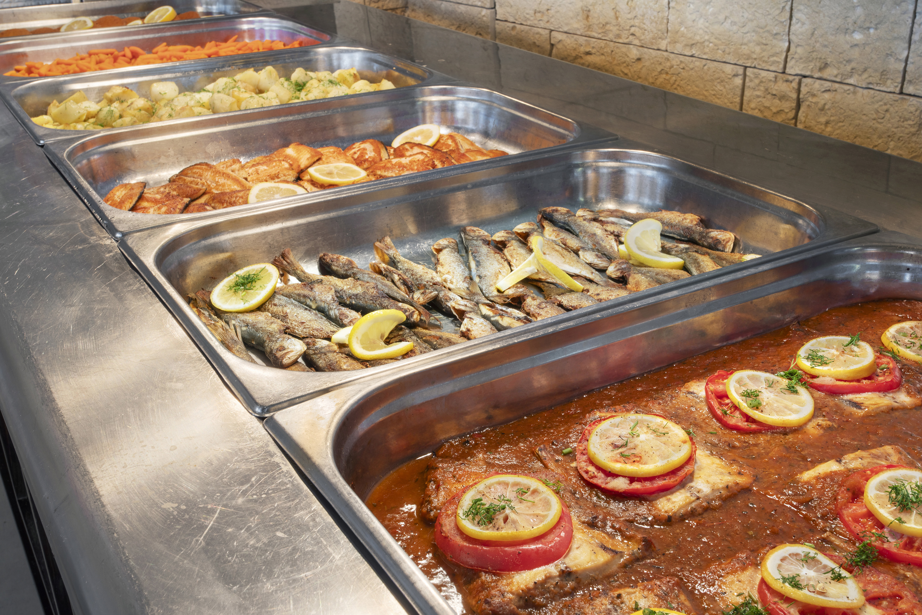 a trays of food in a restaurant
