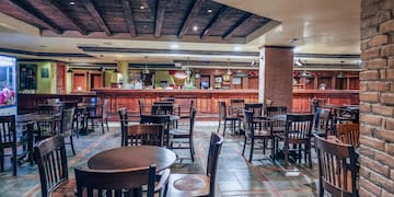 a room with tables and chairs