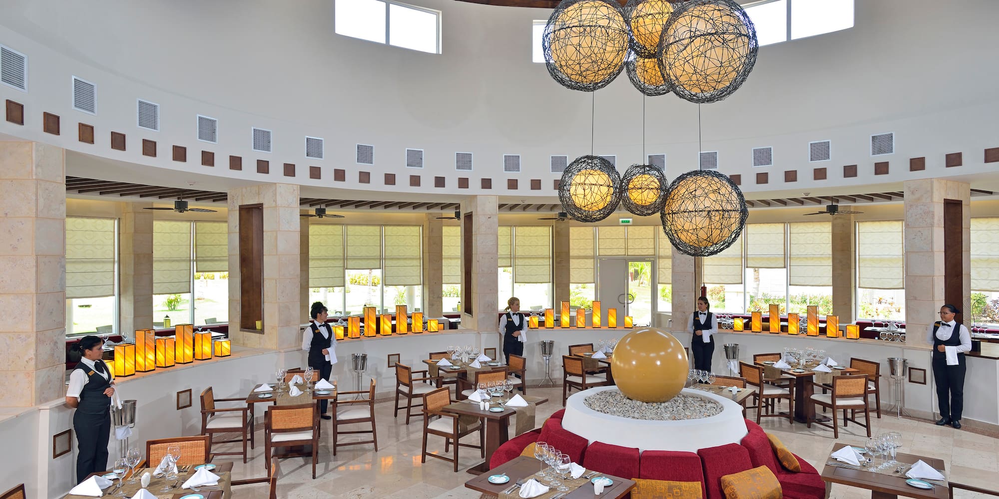 a restaurant with tables and chairs