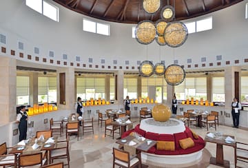 a restaurant with tables and chairs