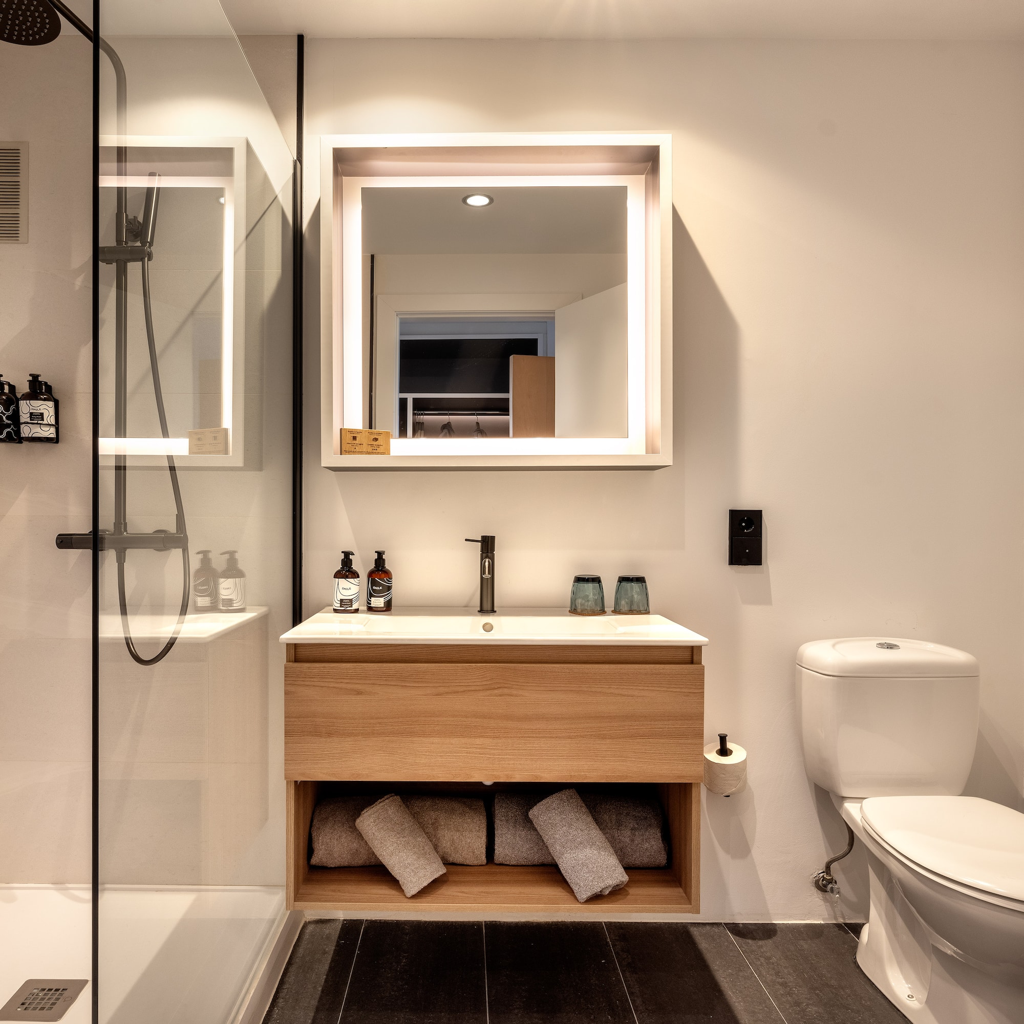 a bathroom with a mirror and a sink