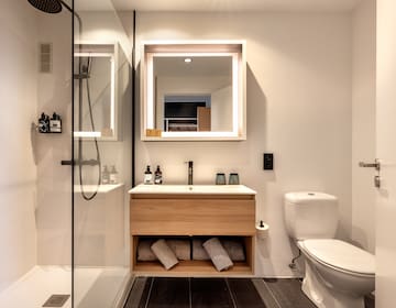 a bathroom with a mirror and a sink