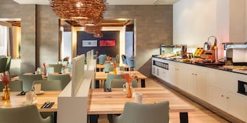 a restaurant with tables and chairs