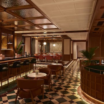 a room with tables and chairs