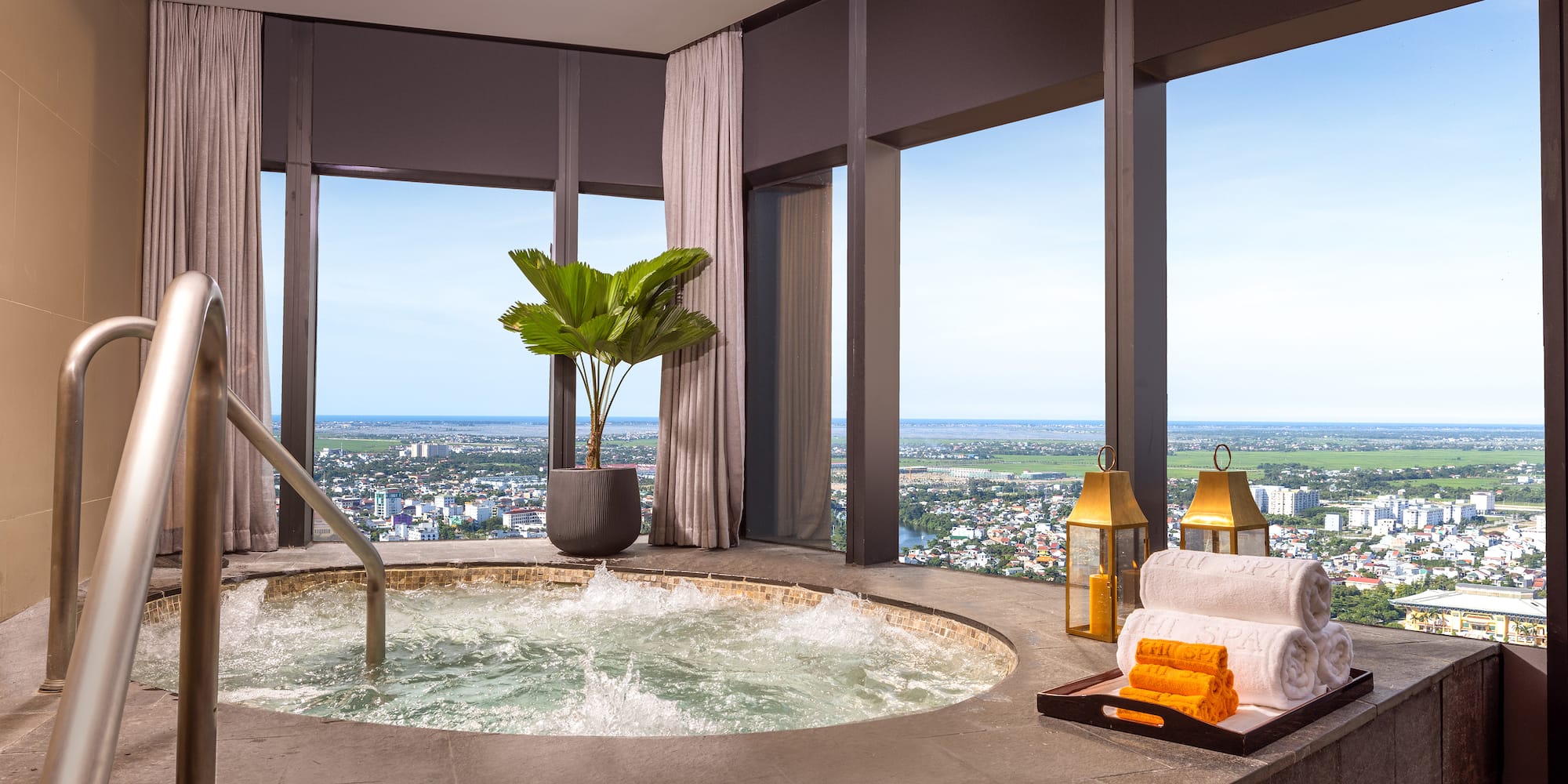 a hot tub with a view of a city
