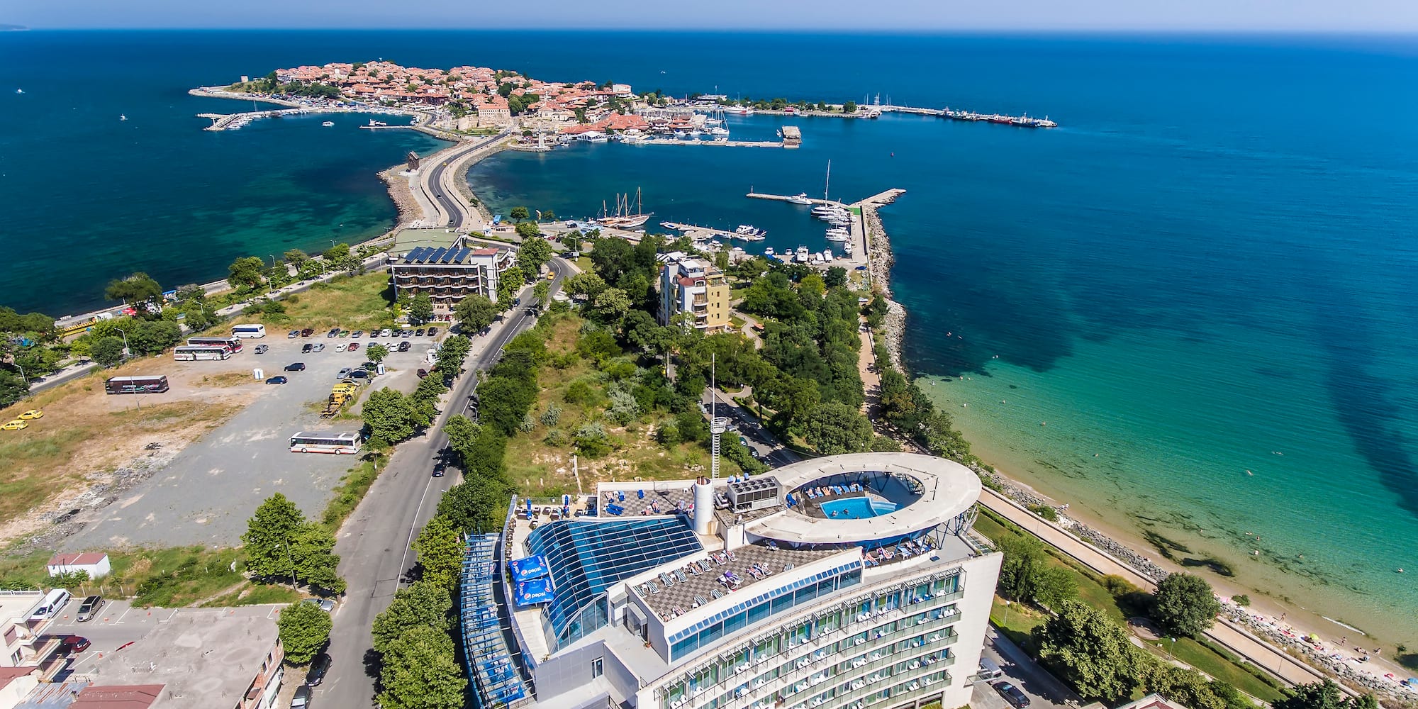 a large building next to a body of water