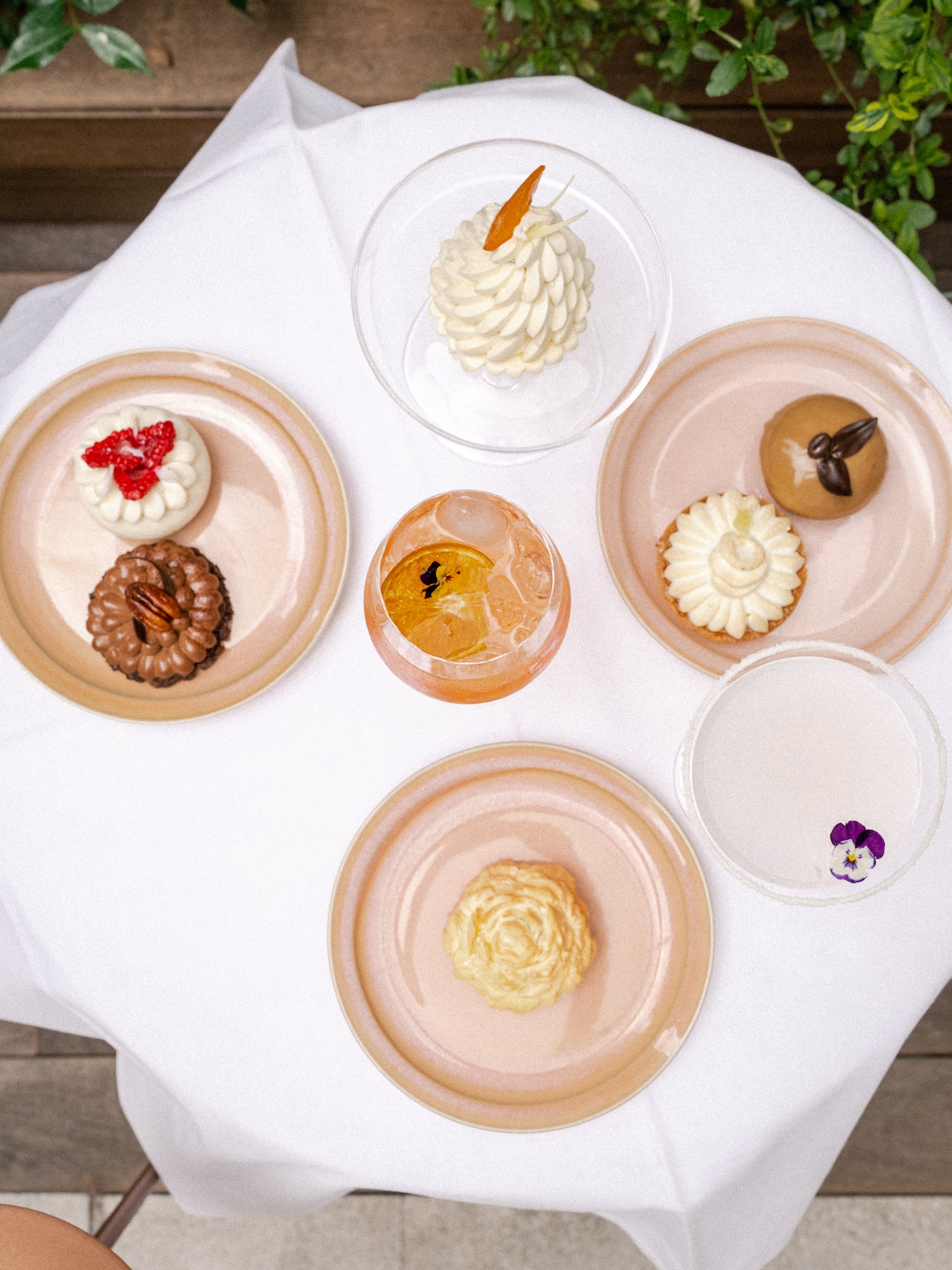 a group of desserts on plates