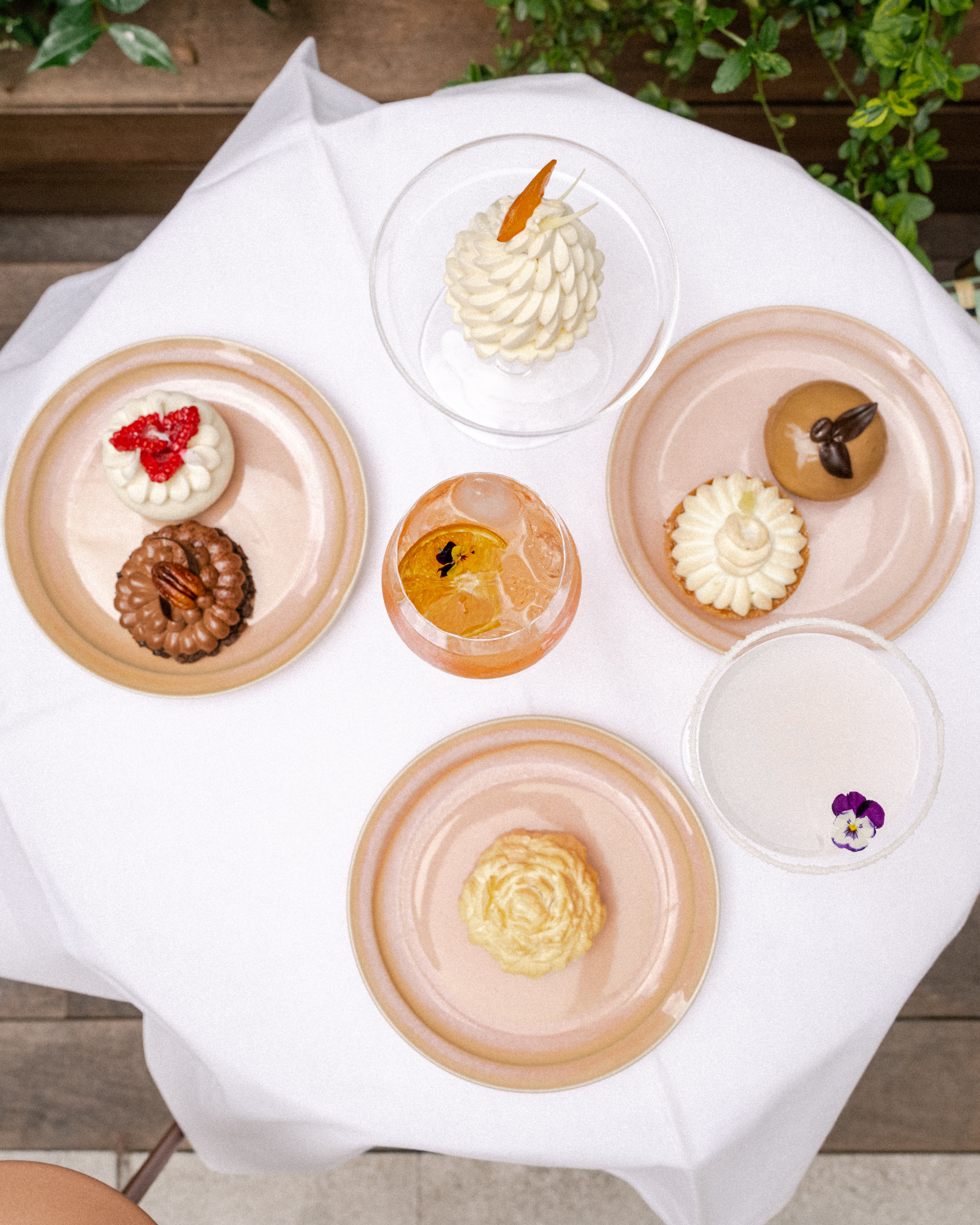 a group of desserts on plates