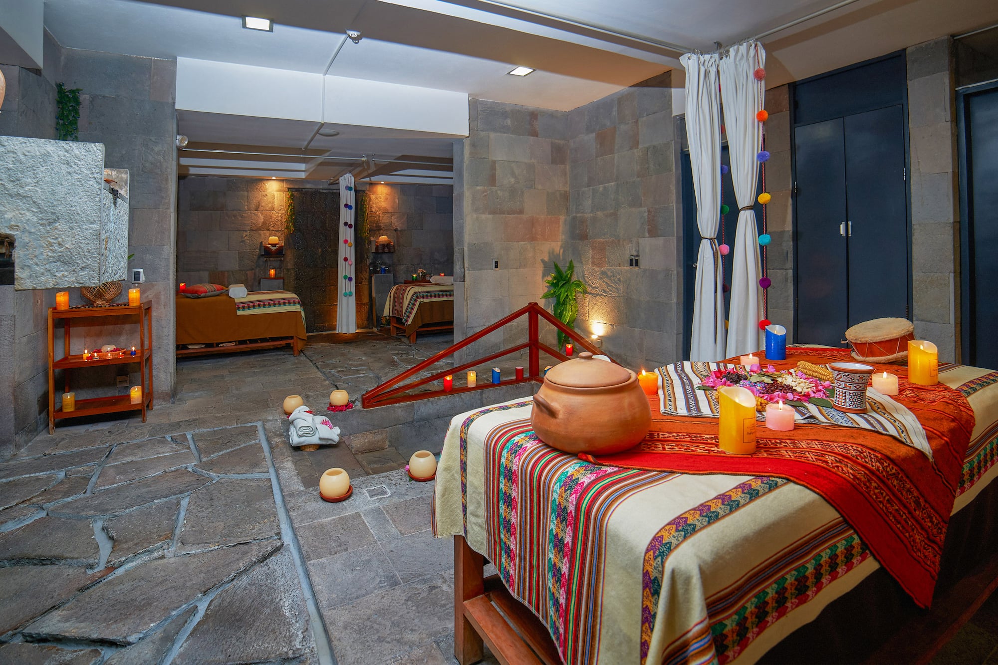 a room with a bed and a pot on it