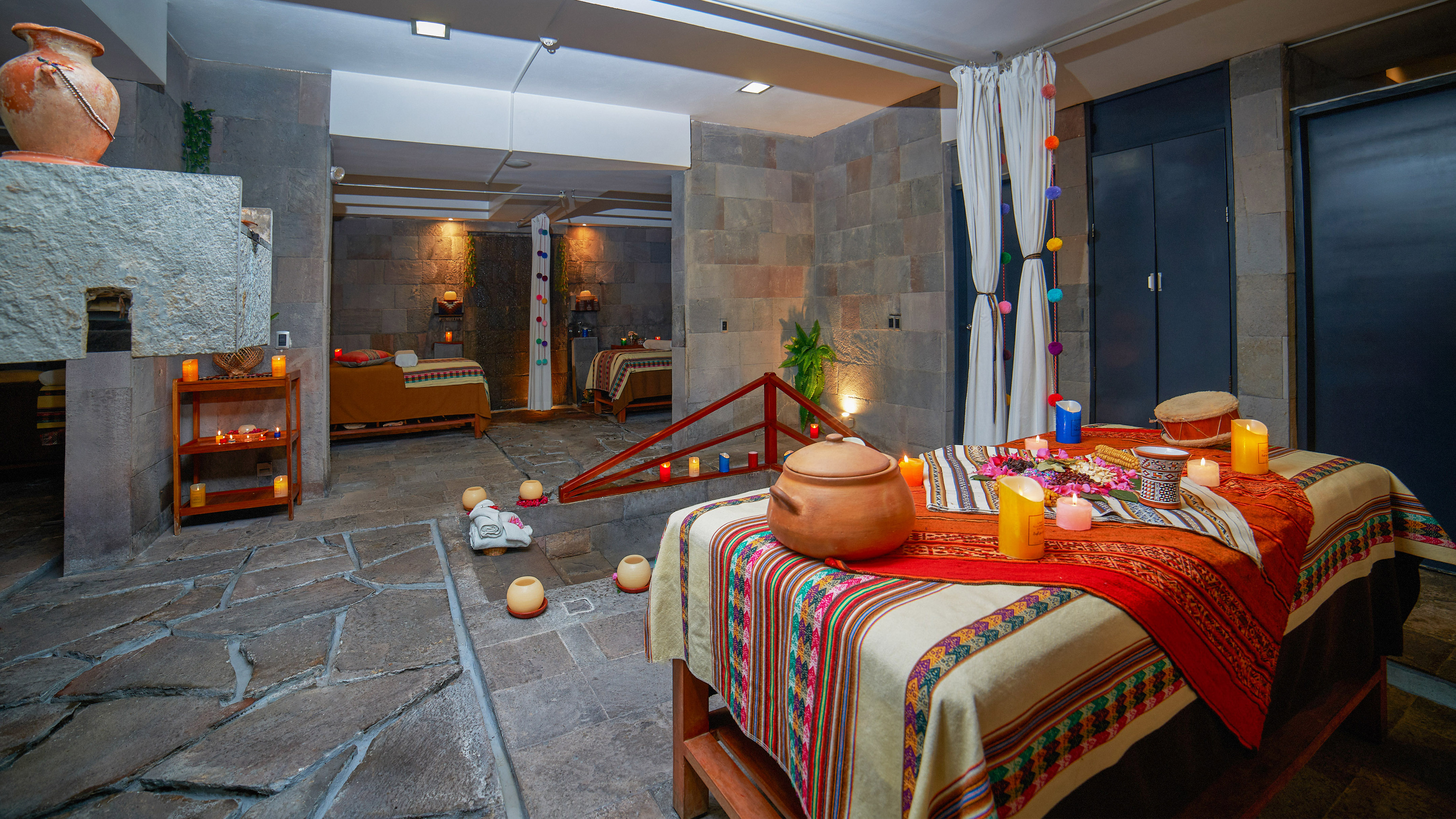 a room with a bed and a pot on it
