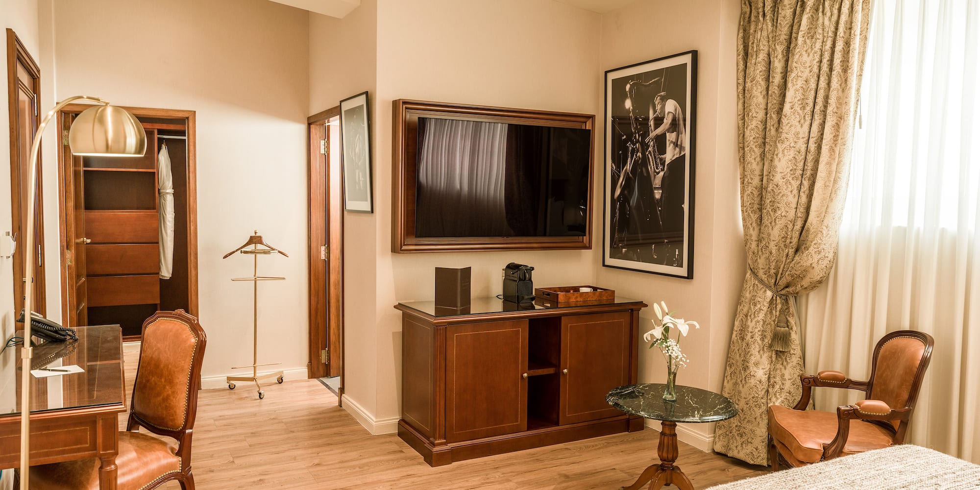 a room with a tv and a table