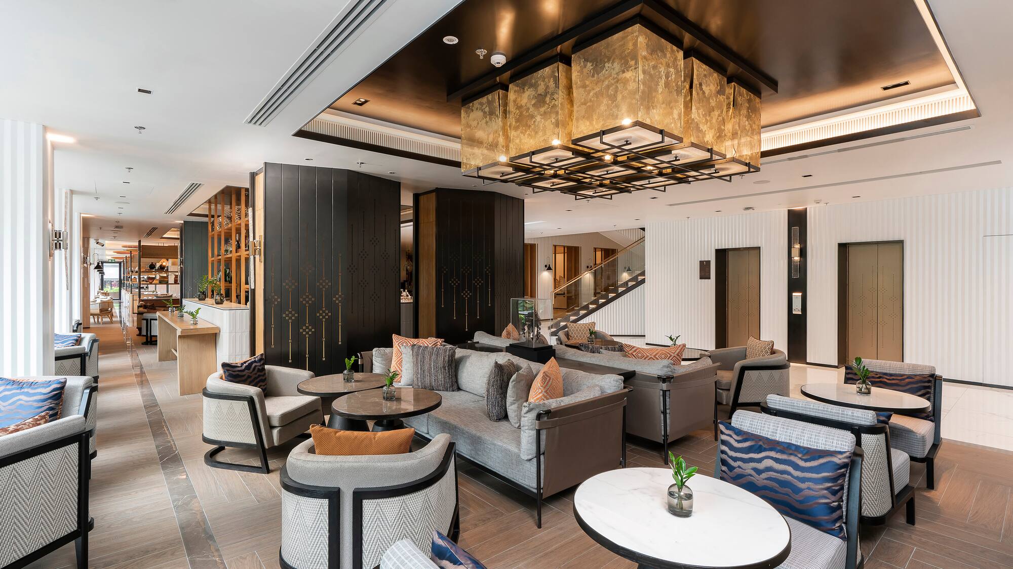 a room with couches and tables