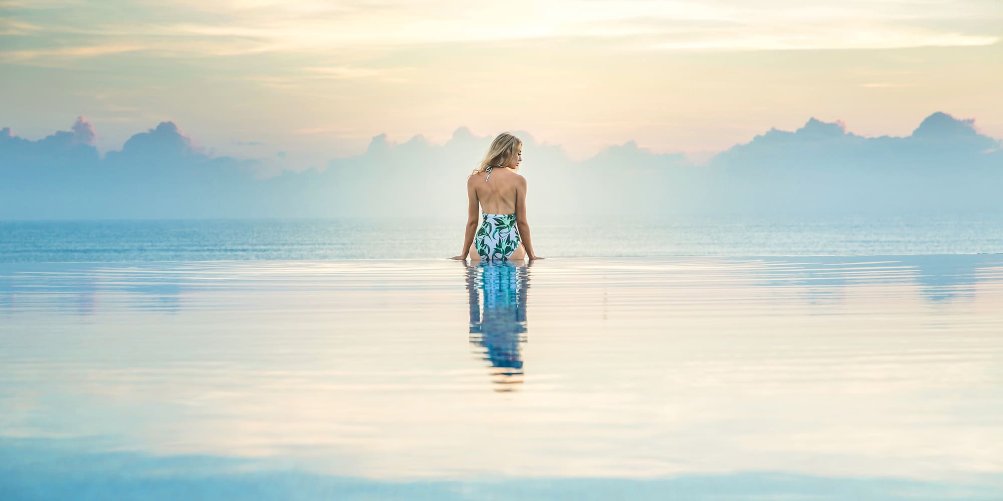 a woman standing in a pool of water