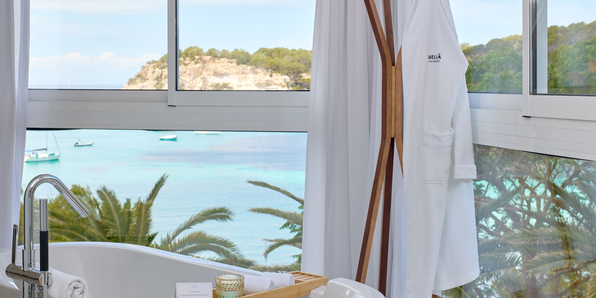 a bathtub next to a window