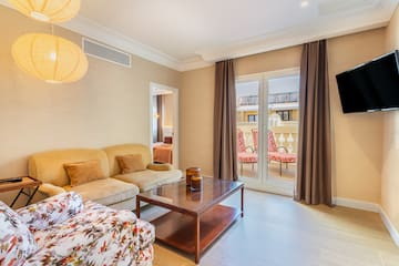 a living room with a couch and a coffee table