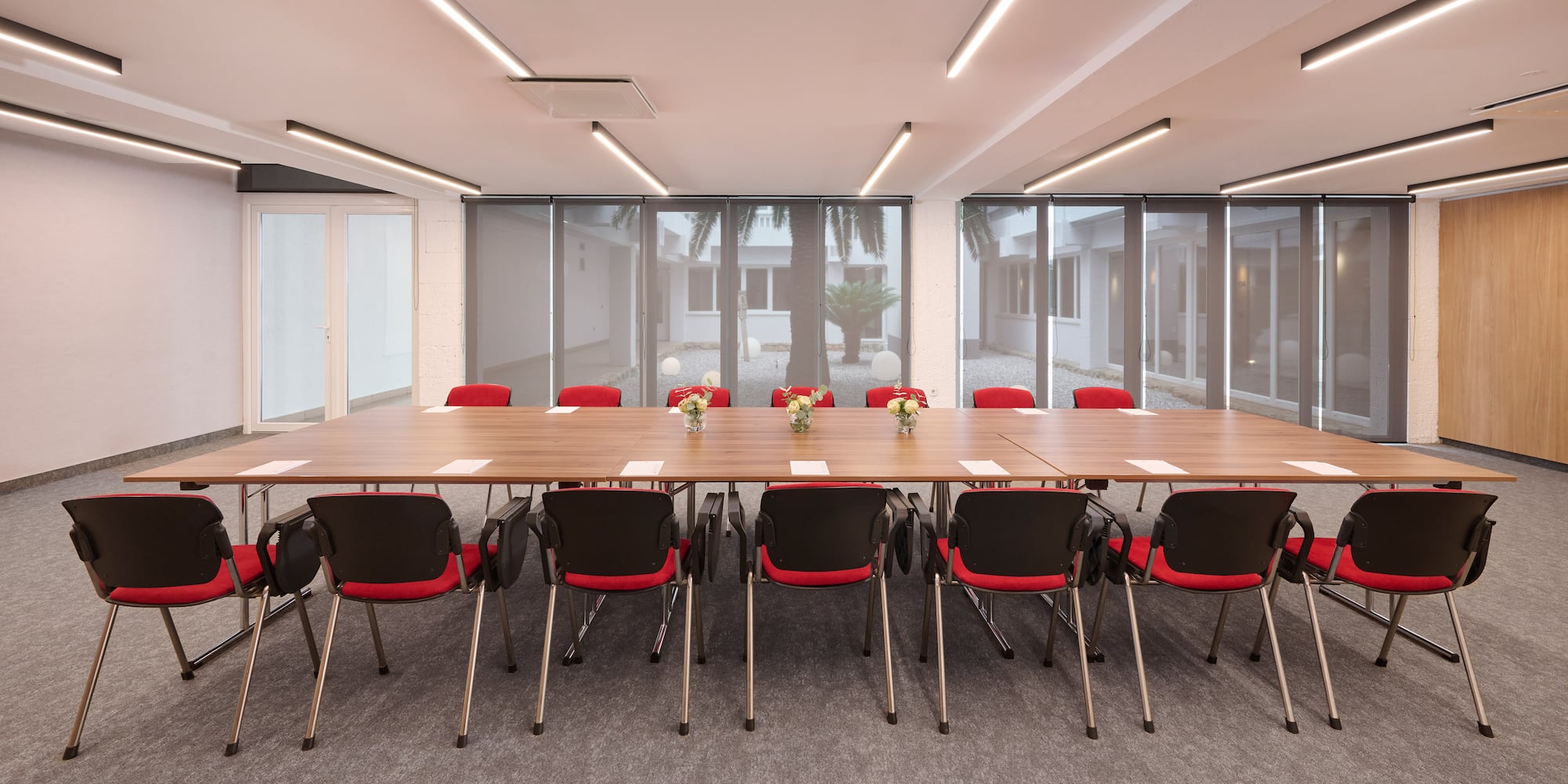 a room with a table and chairs