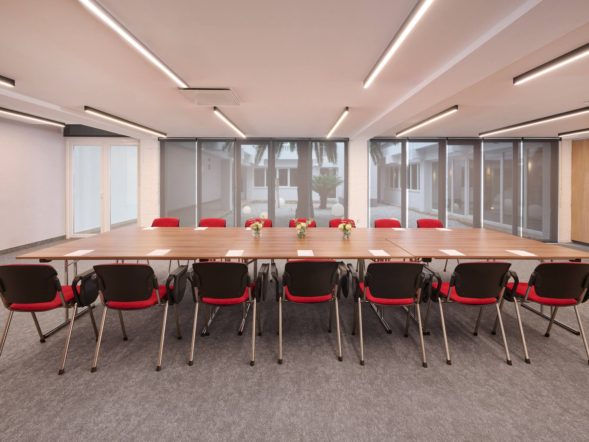 a room with a table and chairs