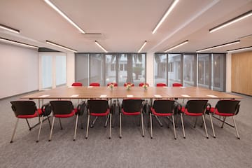 a room with a table and chairs