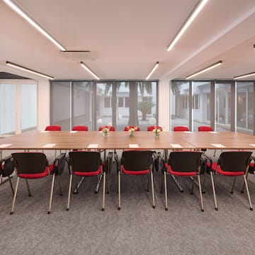 a room with a table and chairs