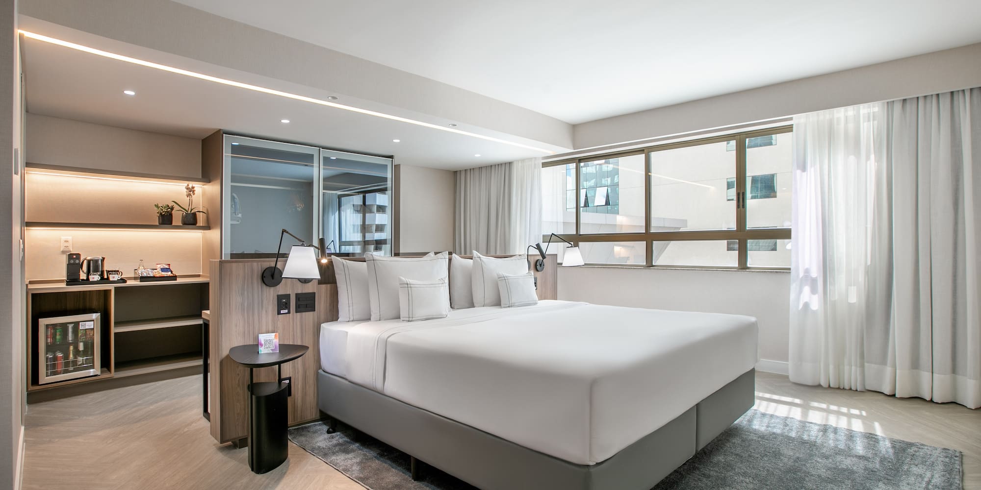 a room with a bed and a window