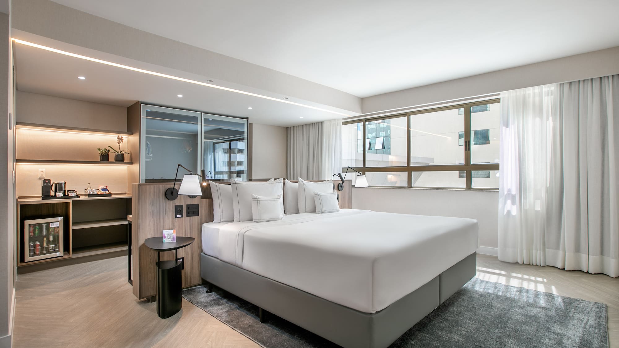 a room with a bed and a window