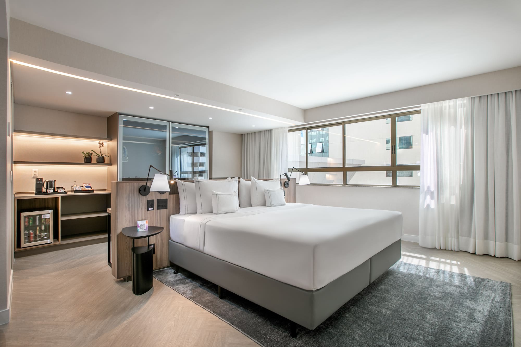 a room with a bed and a window