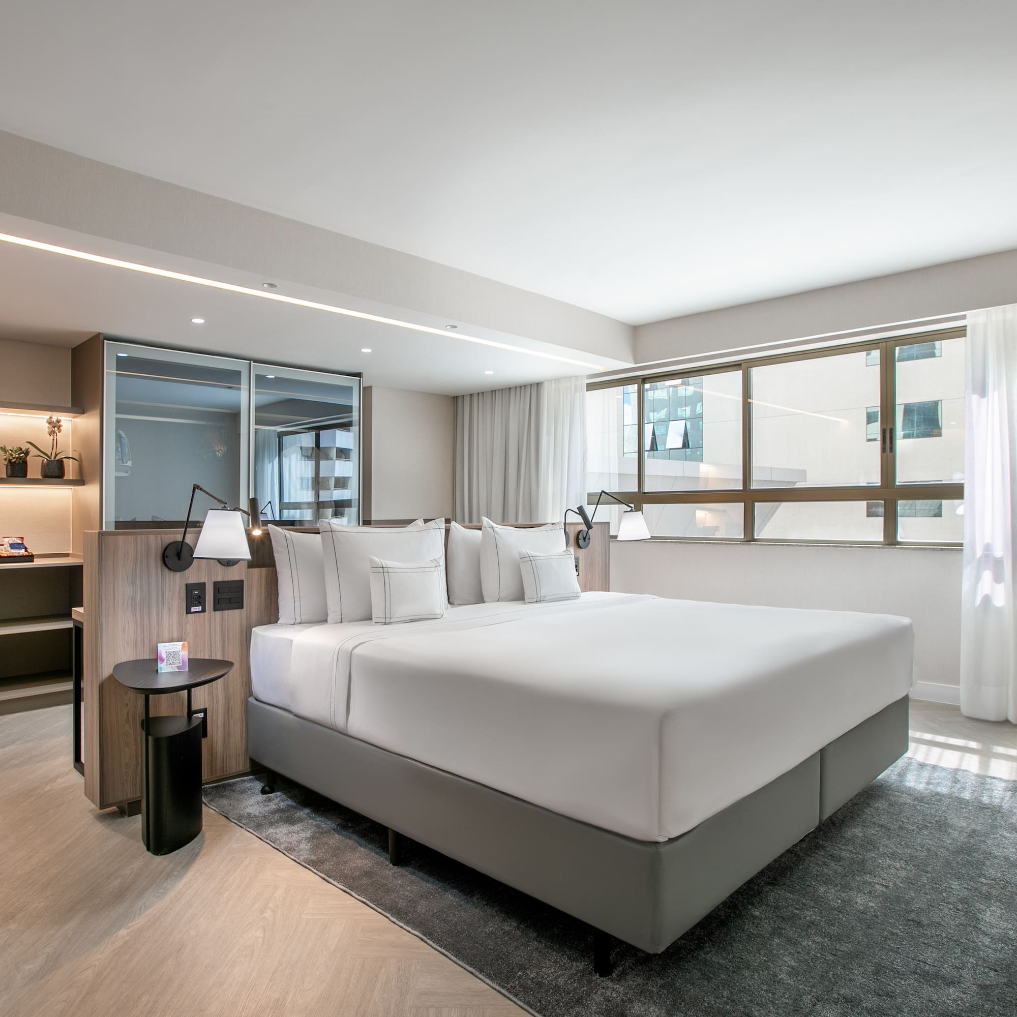 a room with a bed and a window