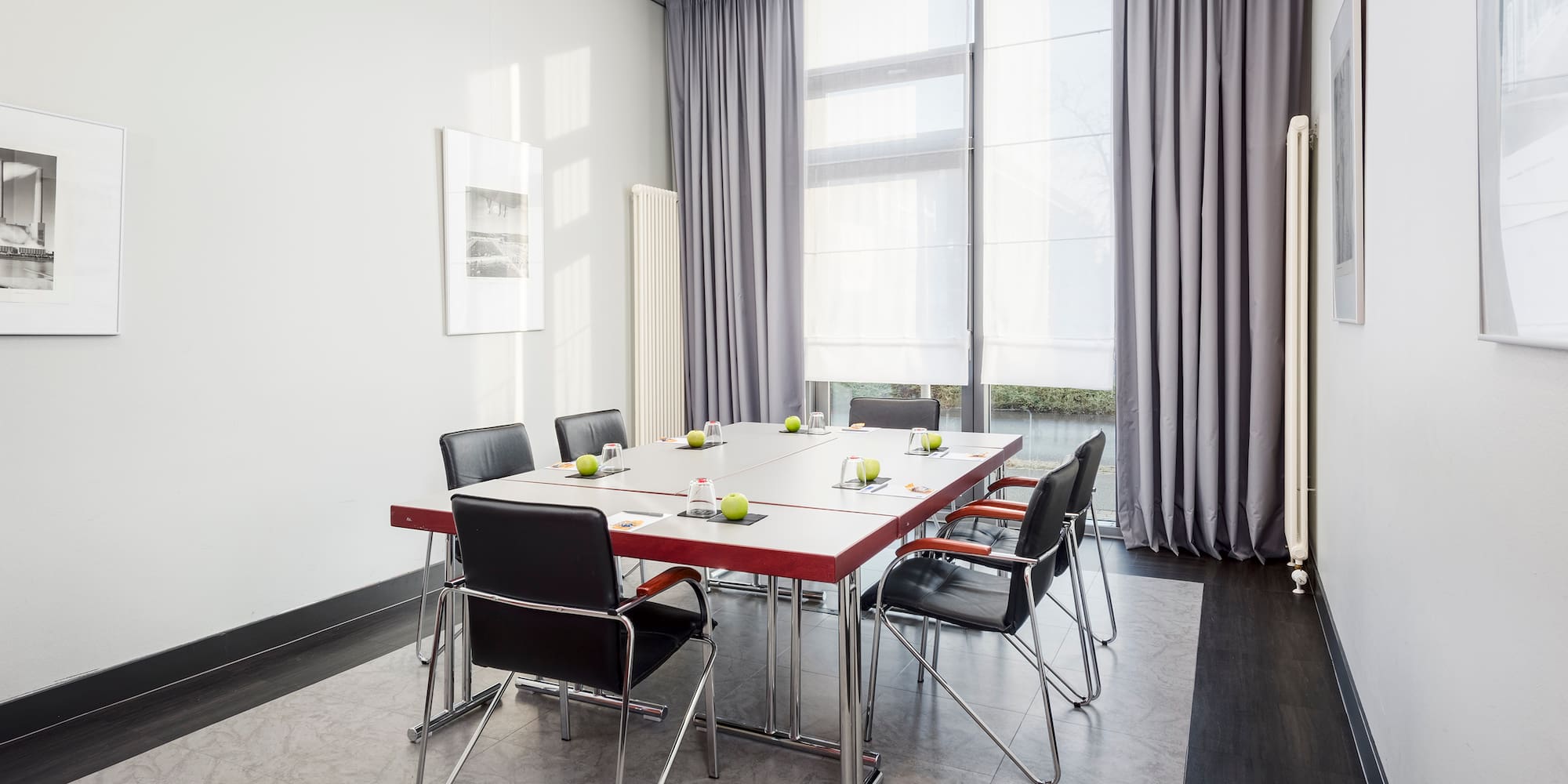 a room with a table and chairs