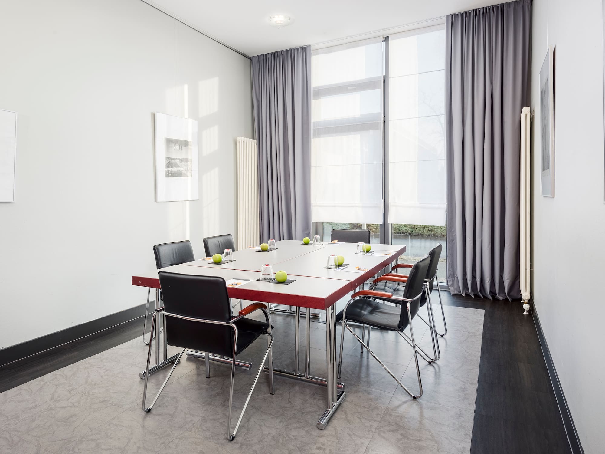 a room with a table and chairs