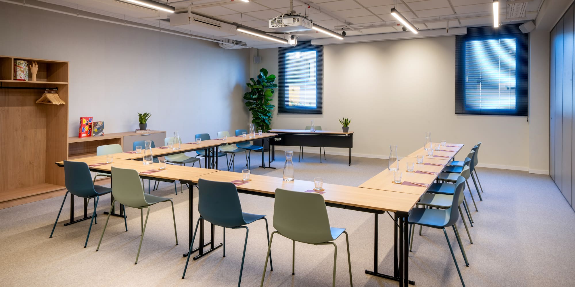 a room with tables and chairs