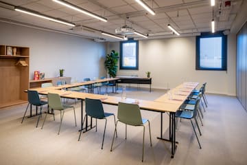 a room with tables and chairs