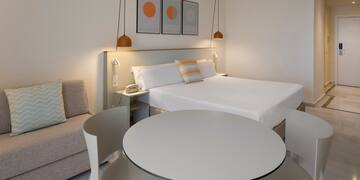 a room with a bed and a table