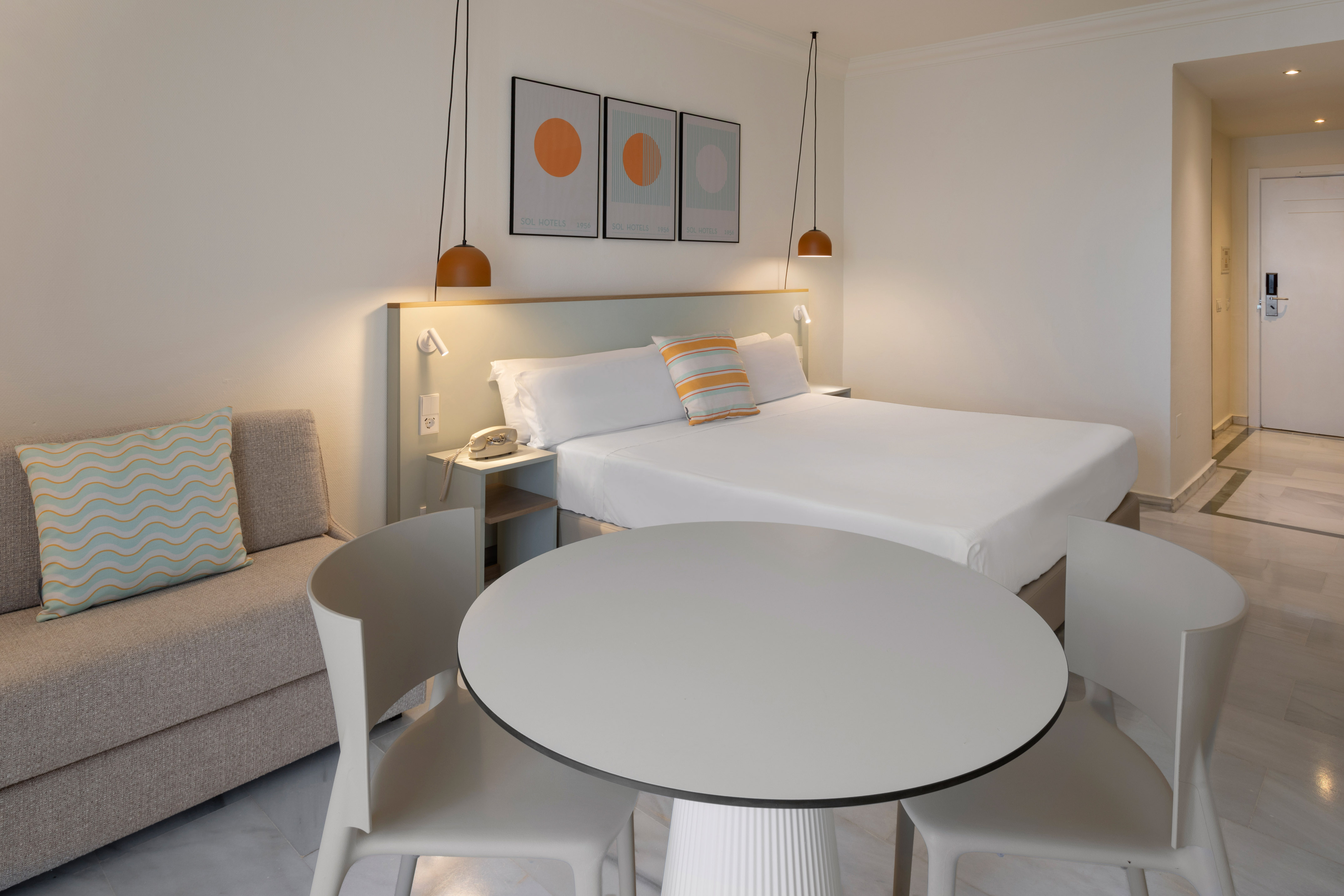 a room with a bed and a table