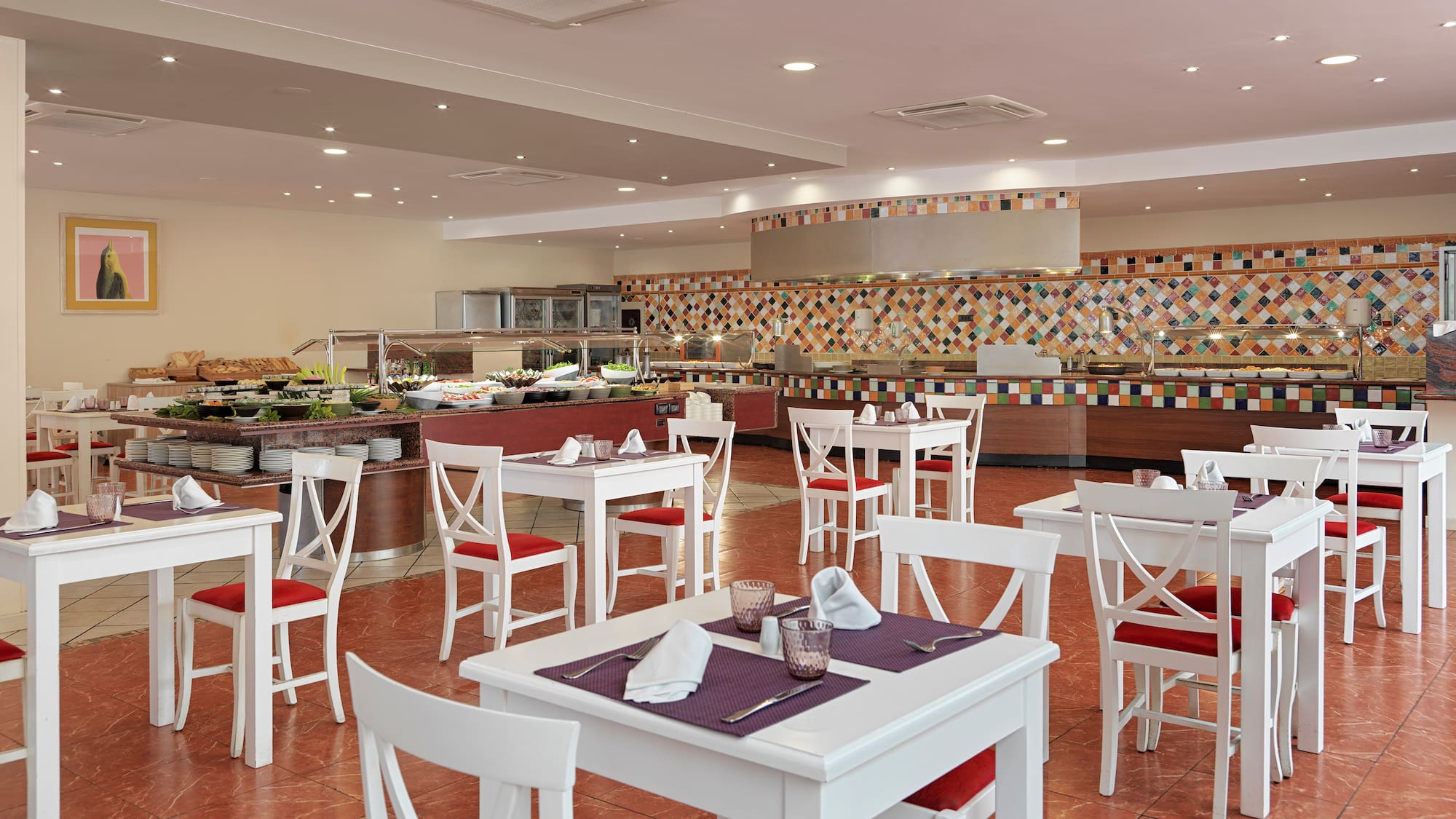 a restaurant with tables and chairs