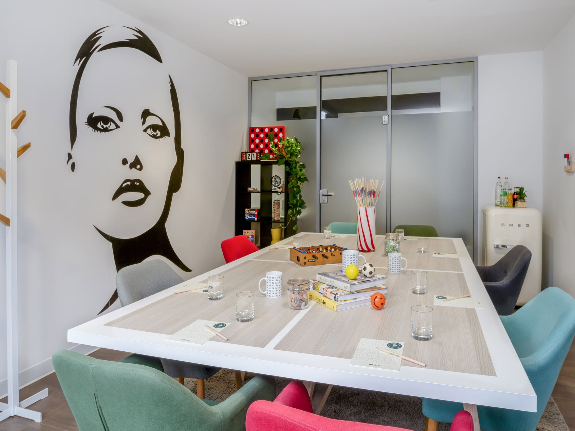 a room with a table and chairs