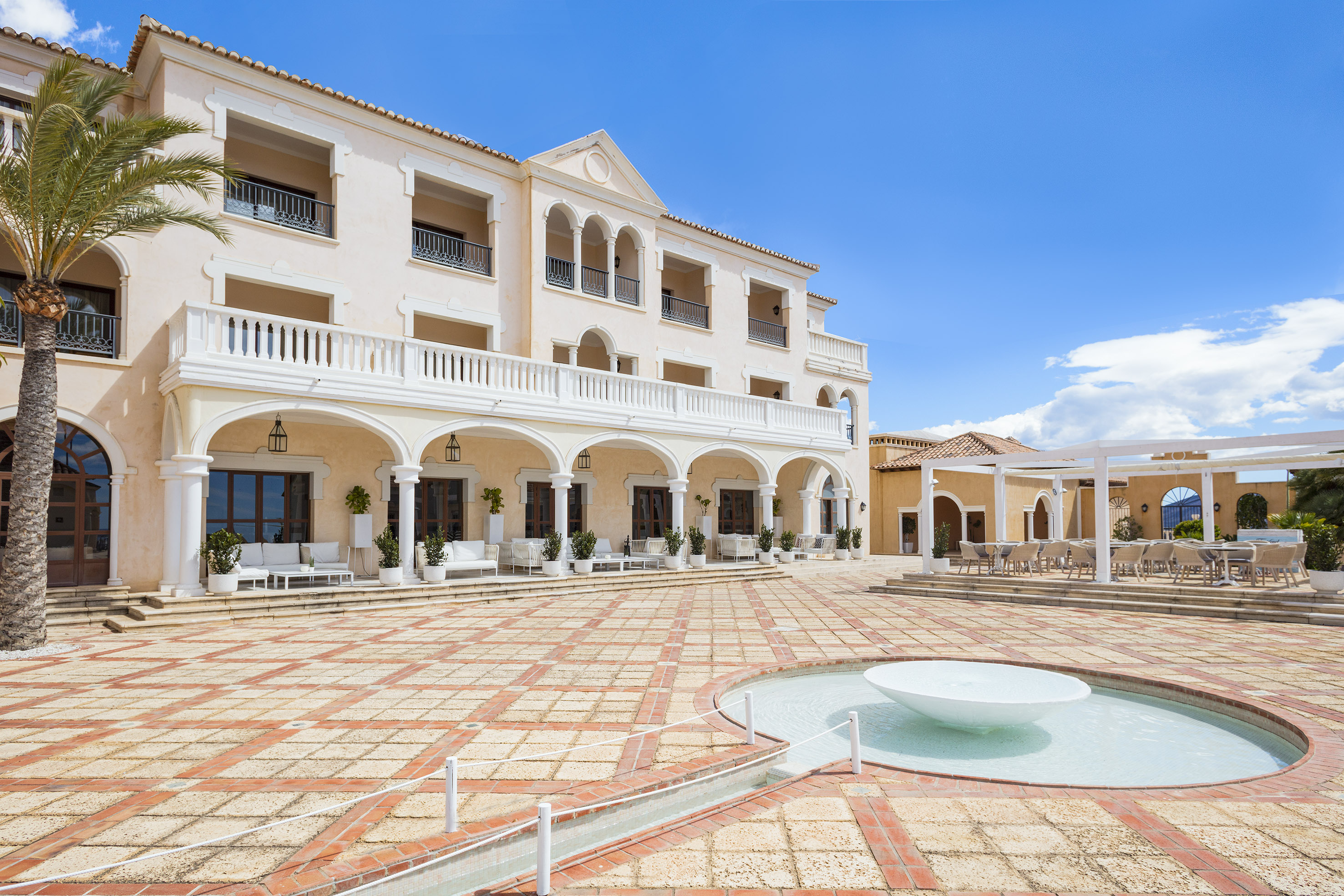 a building with a fountain in front of it