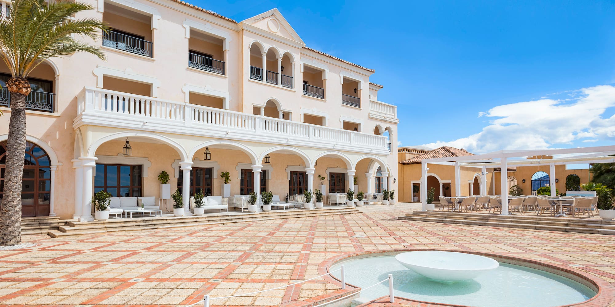 a building with a fountain in front of it