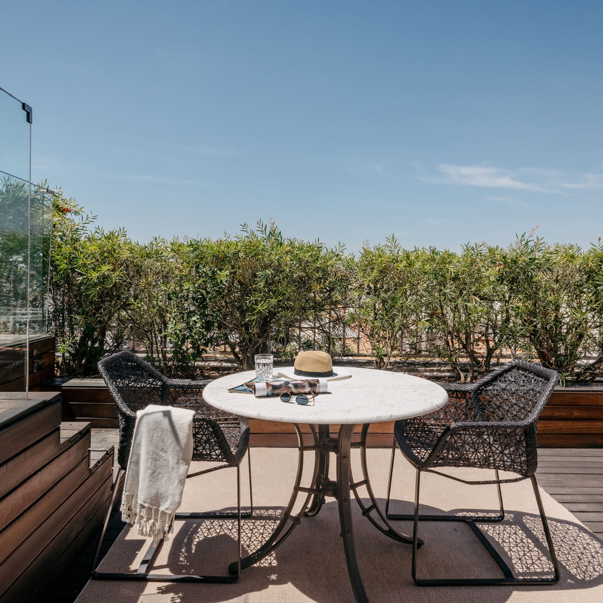 a table and chairs on a deck