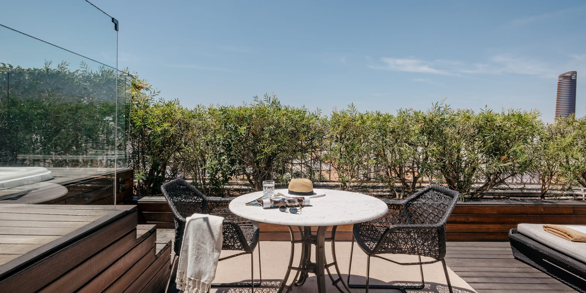 a table and chairs on a deck
