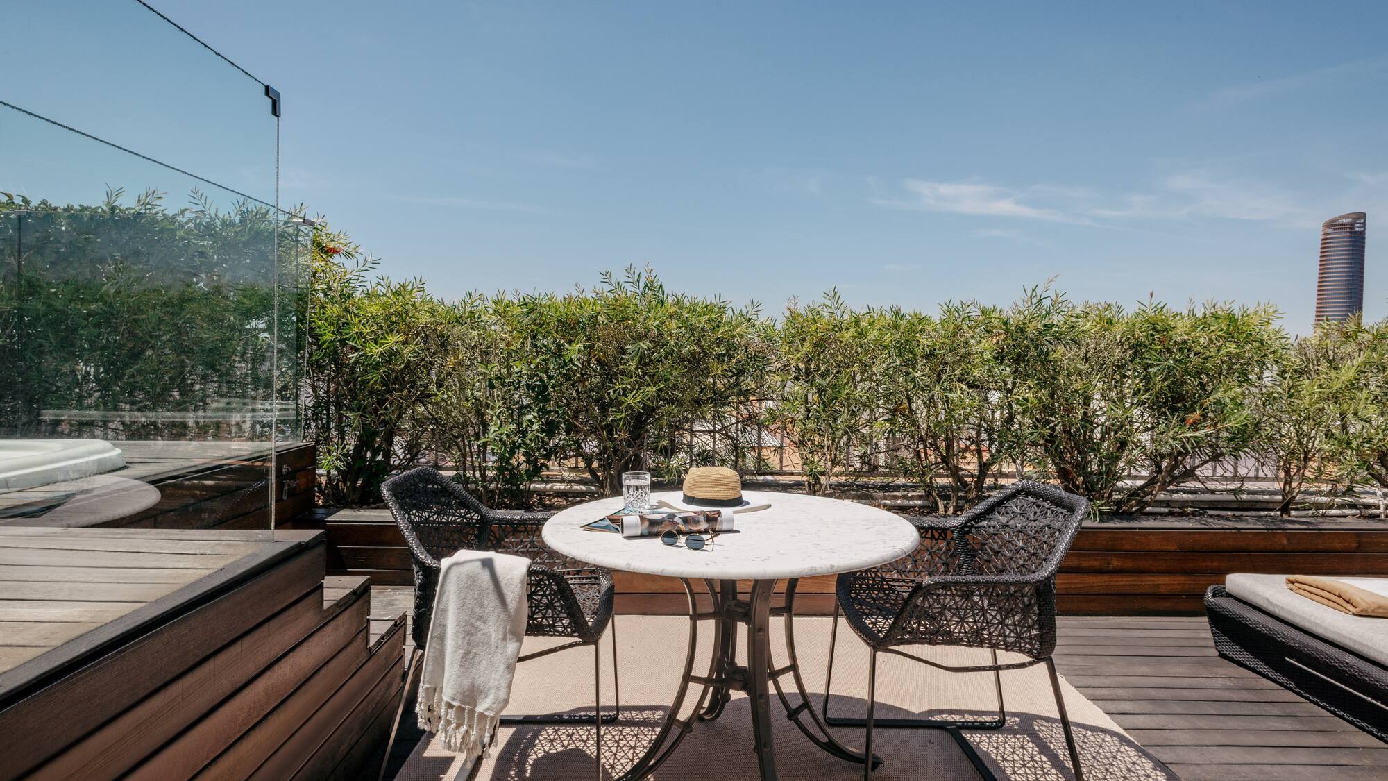 a table and chairs on a deck