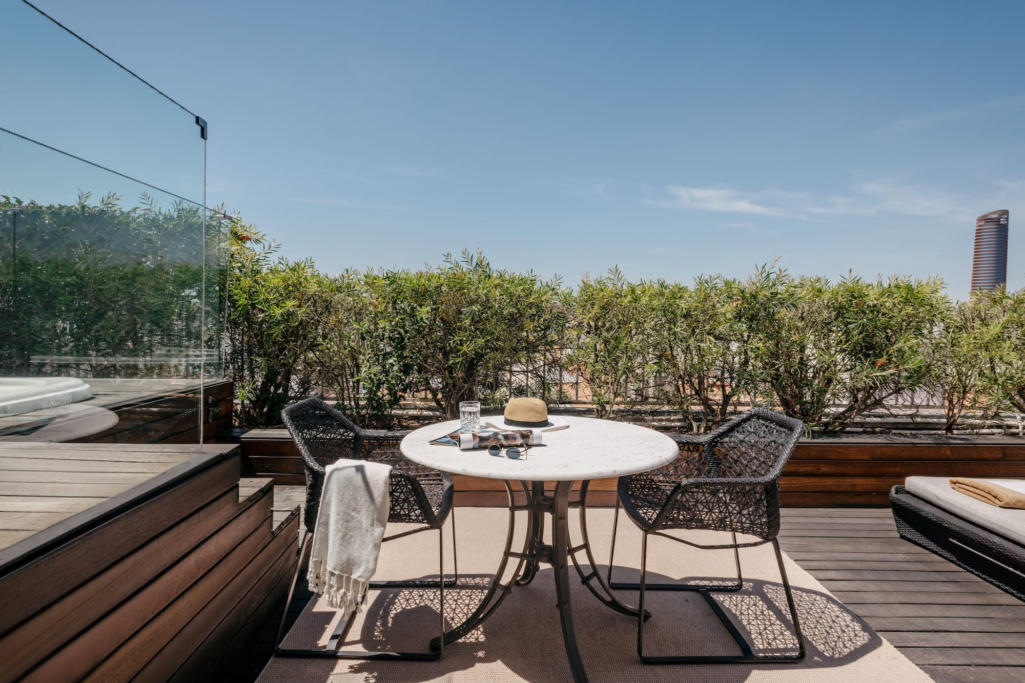 a table and chairs on a deck