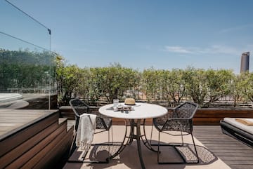 a table and chairs on a deck