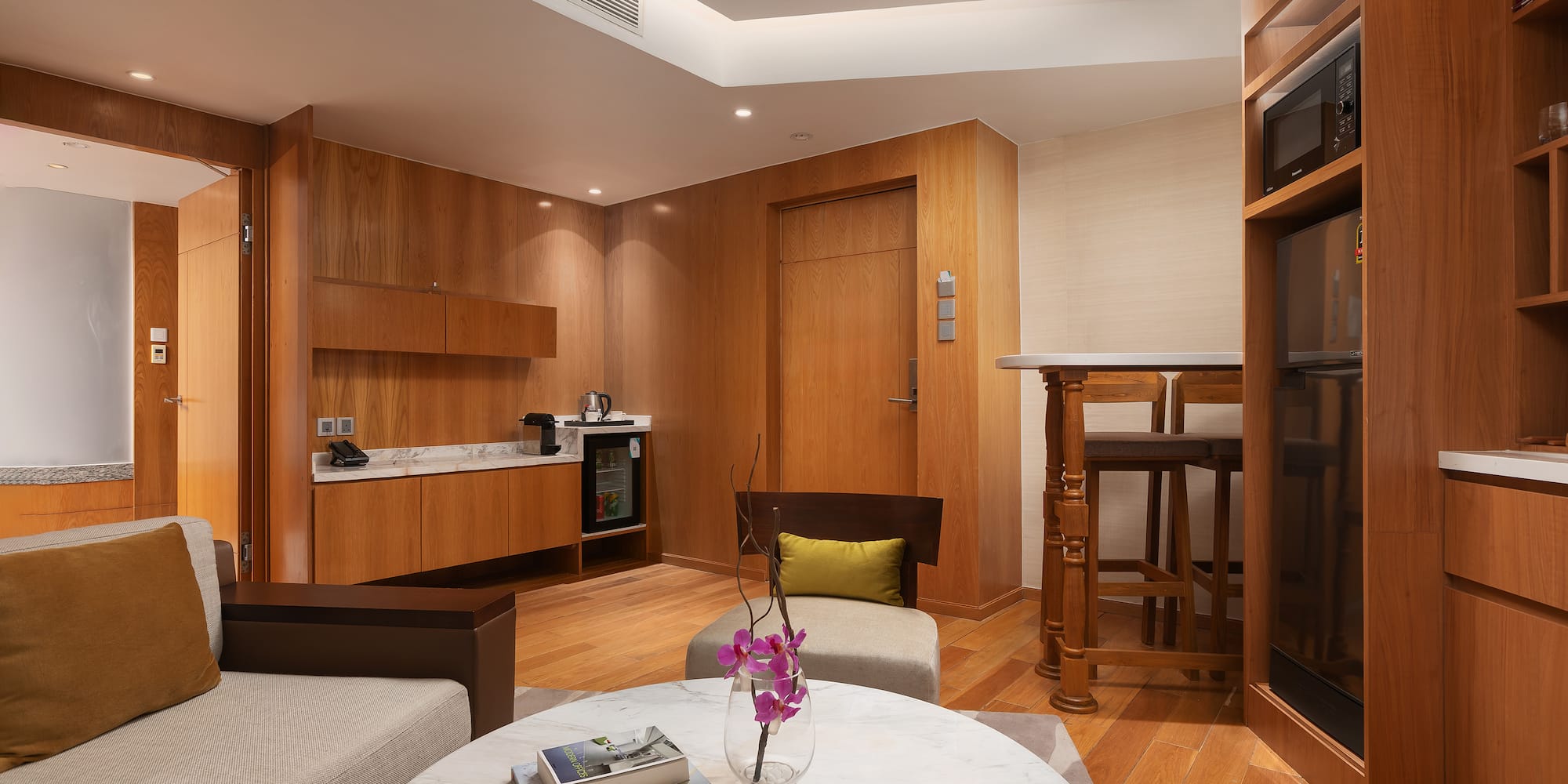 a room with a table and chairs