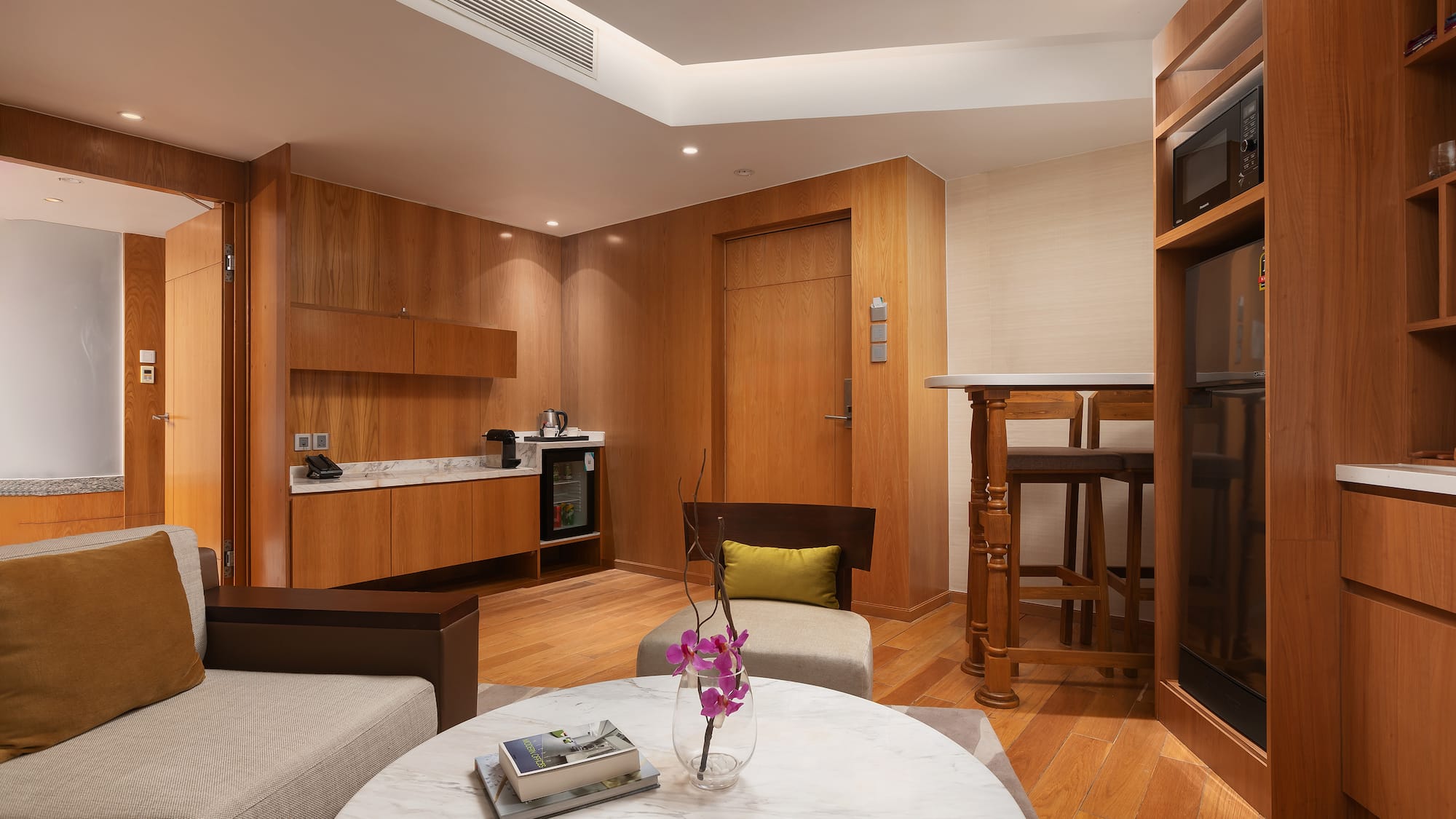 a room with a table and chairs