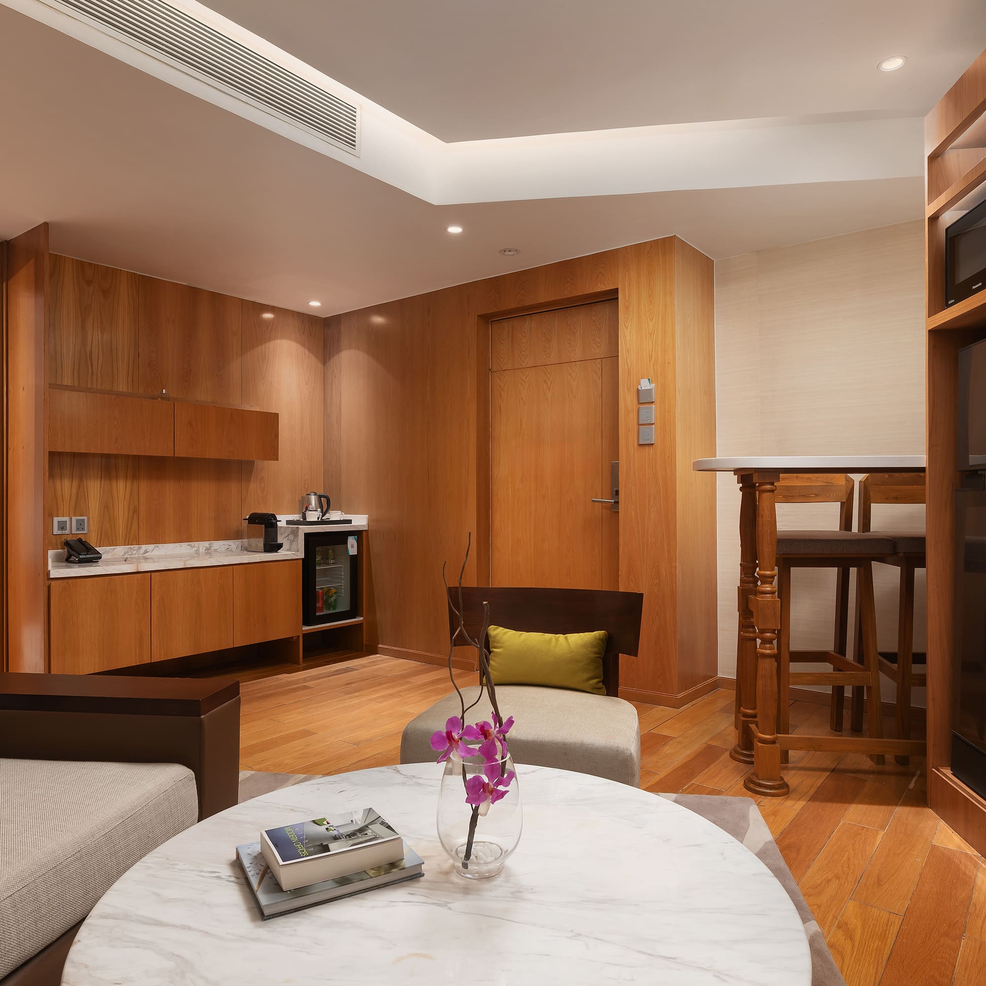 a room with a table and chairs