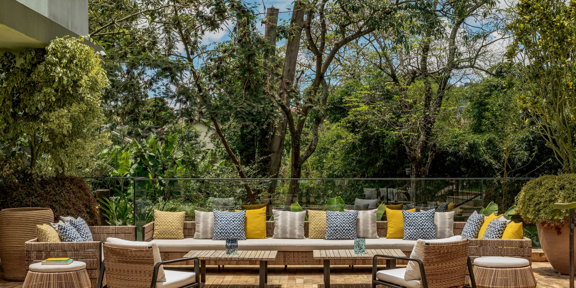 a patio with a table and chairs