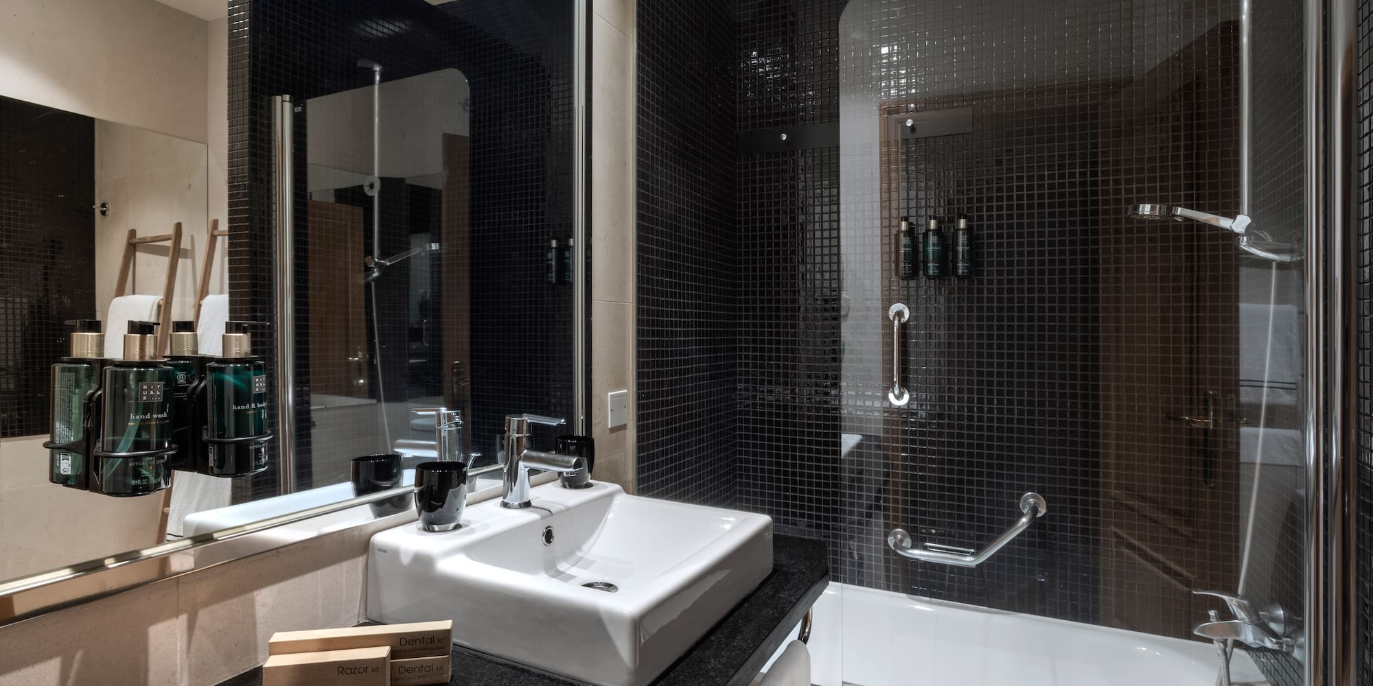 a bathroom with a sink and shower