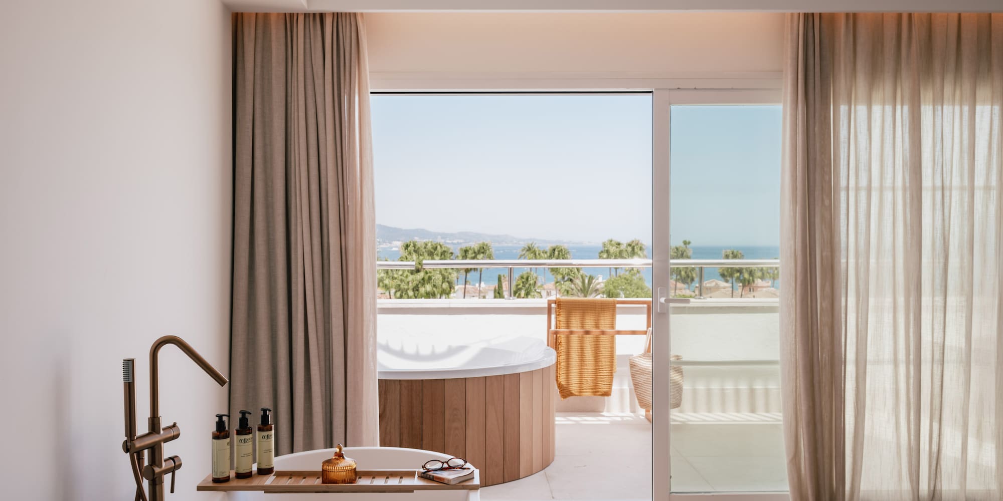 a bathroom with a tub and a jacuzzi