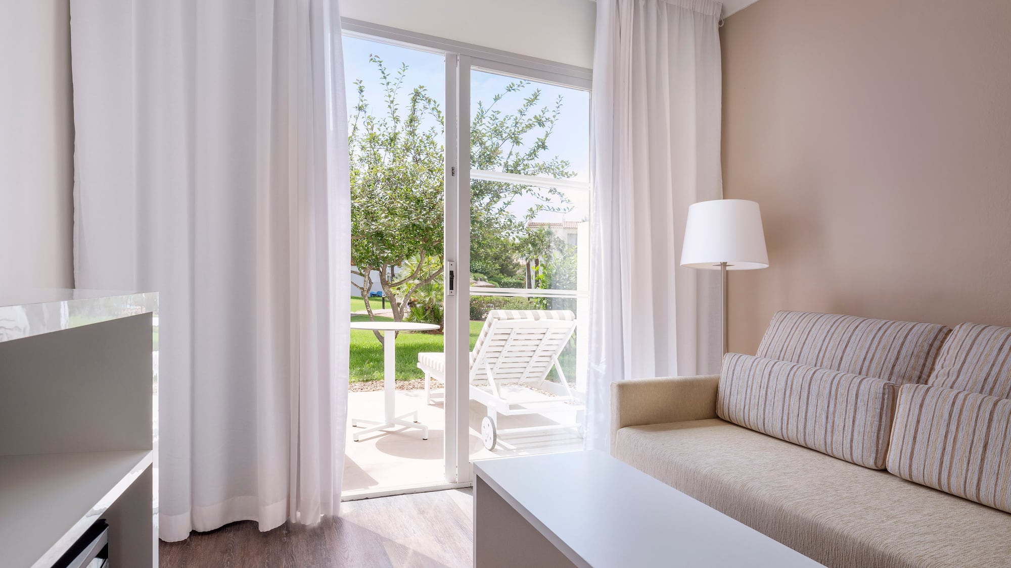 a living room with a couch and a table